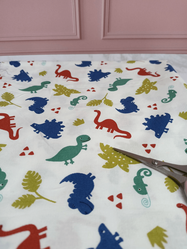 Tissu coton blanc et dinosaures