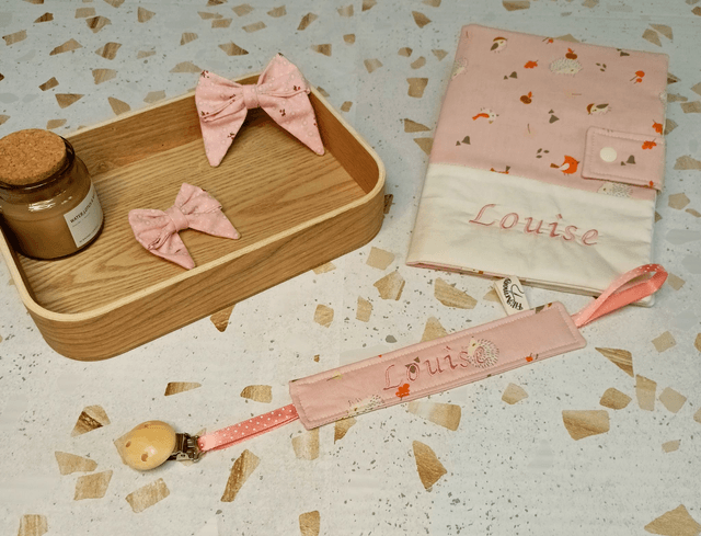 Attache-tétine rose Louise